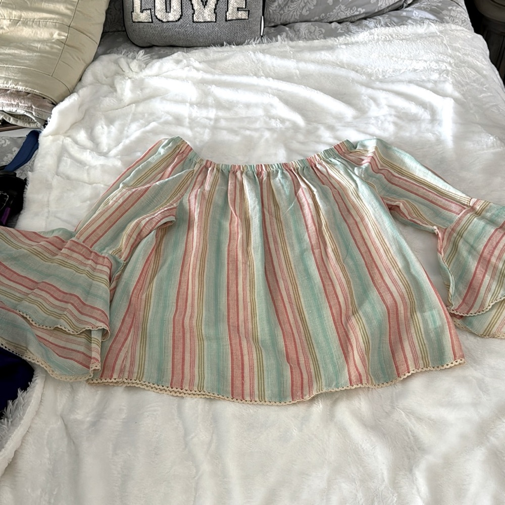 Woman’s off shoulder bojo summer top. Various summer colors.